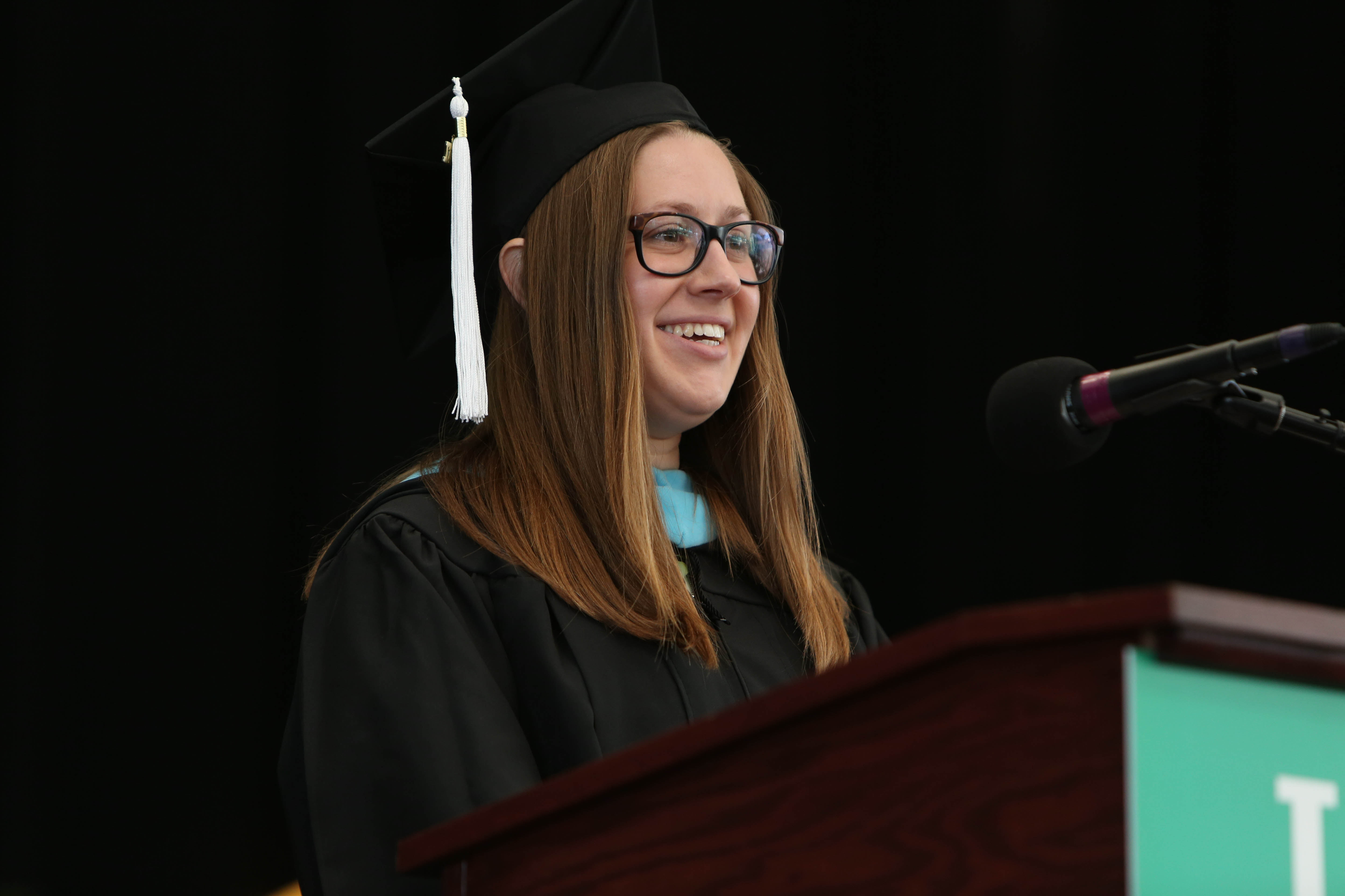 Student speaker Molly Pistrang touted the “compassion that resonates at Lesley.”