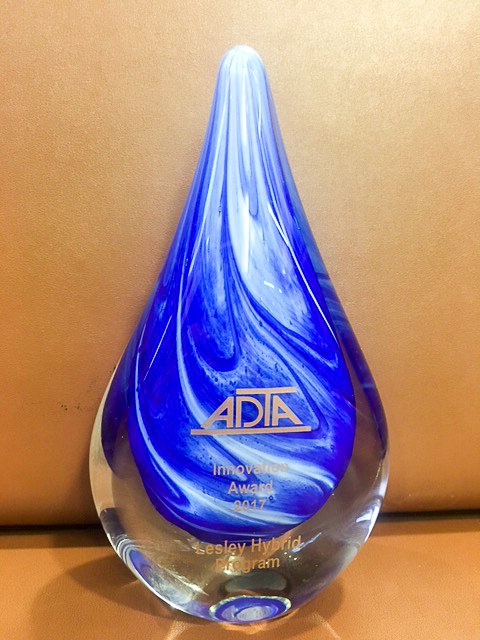 The ADTA award: a glass teardrop-shaped trophy printed with "Lesley Hybrid Program."