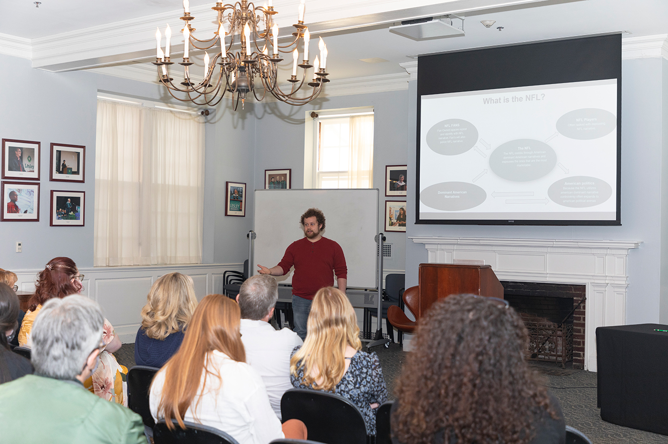 A photo of Henry Katzman presenting his Honors research project in Alumni Hall at the 2022 Honors Symposium
