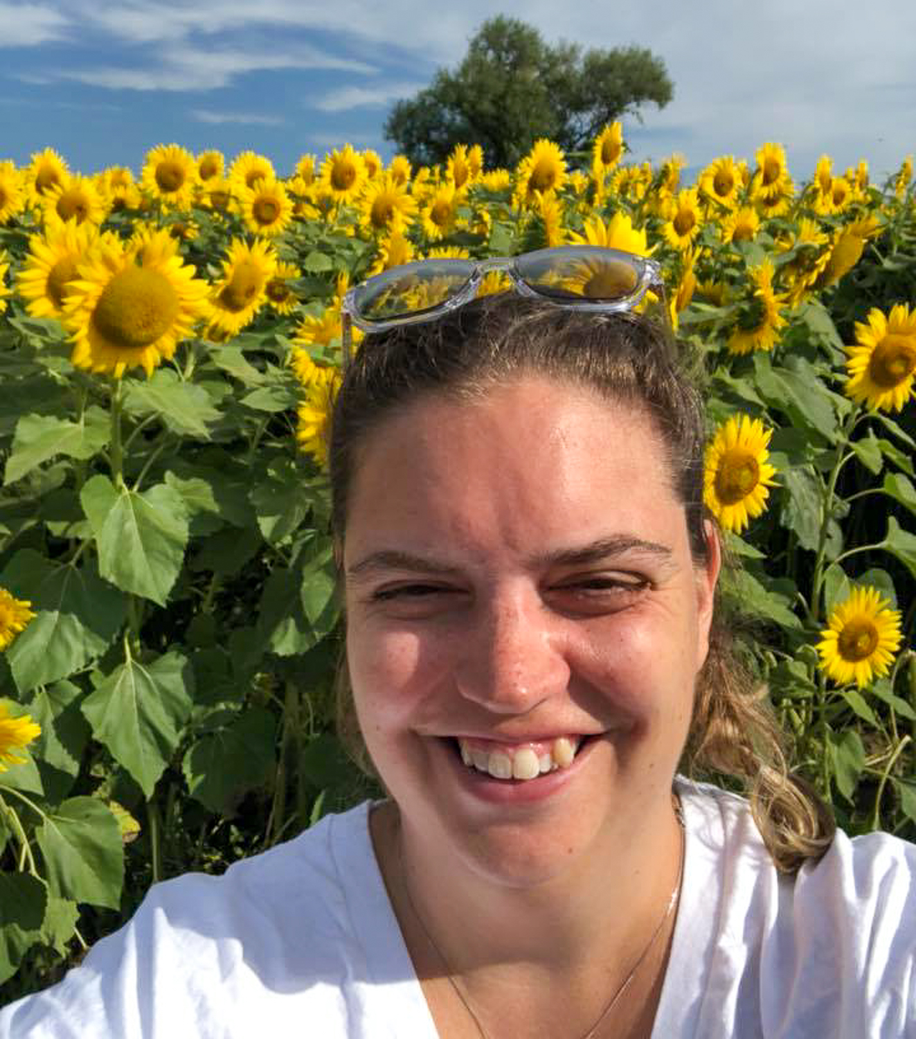 Kate Contini selfie in field of sunflowers
