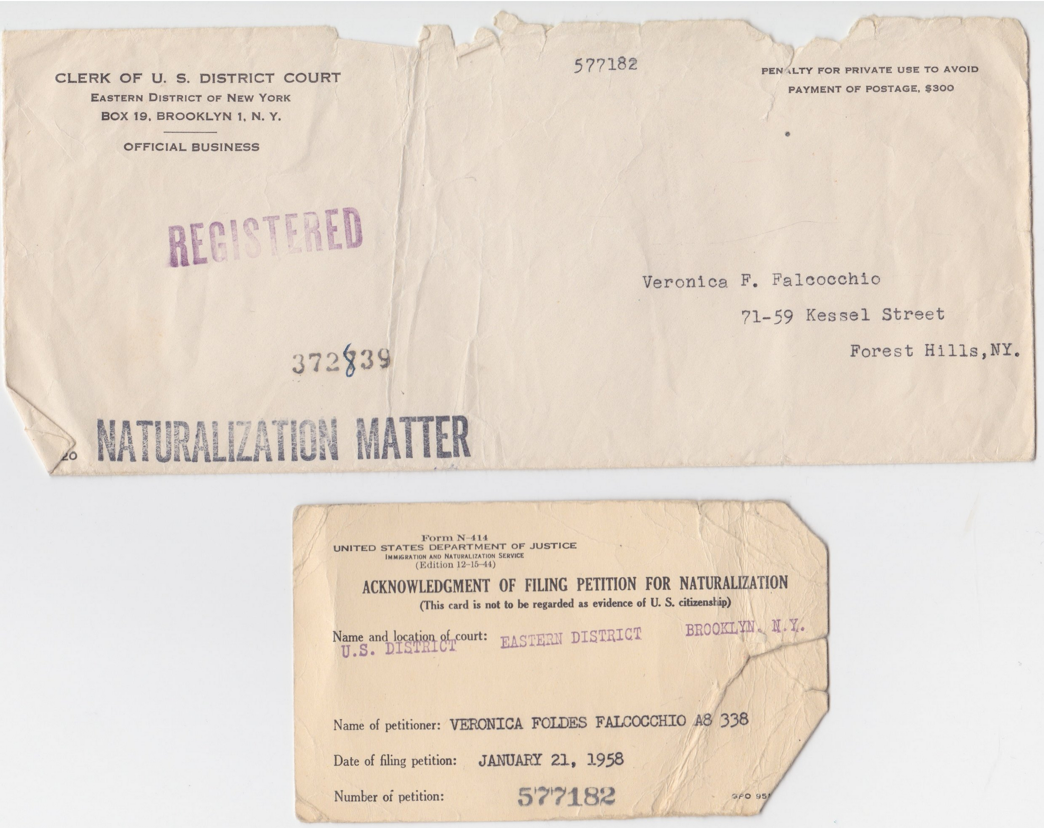 Old envelope and card documenting Maya Erdelyi's grandmother's naturalization