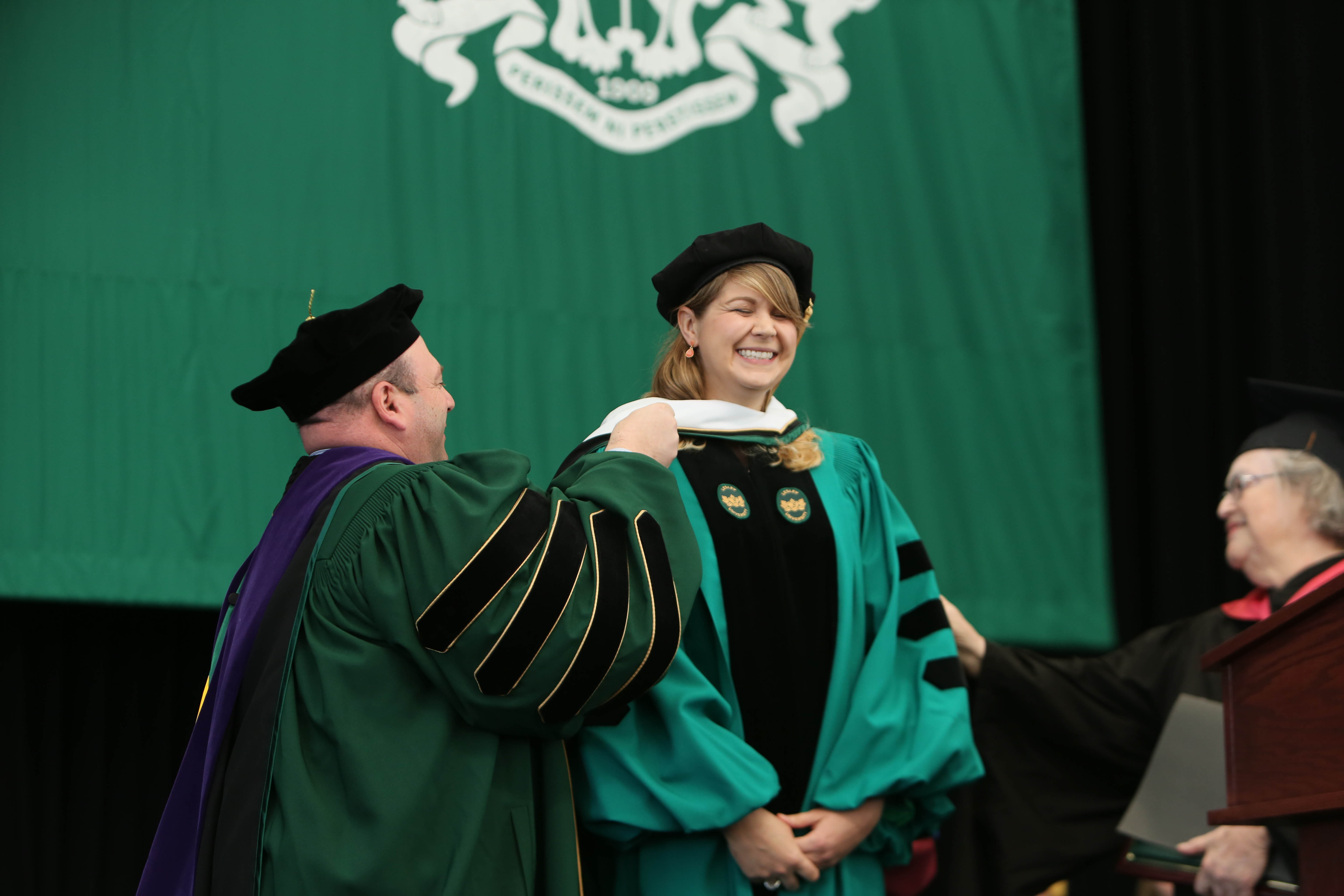 National Teacher of the Year Sydney Chaffee receives her honorary degree at commencement.