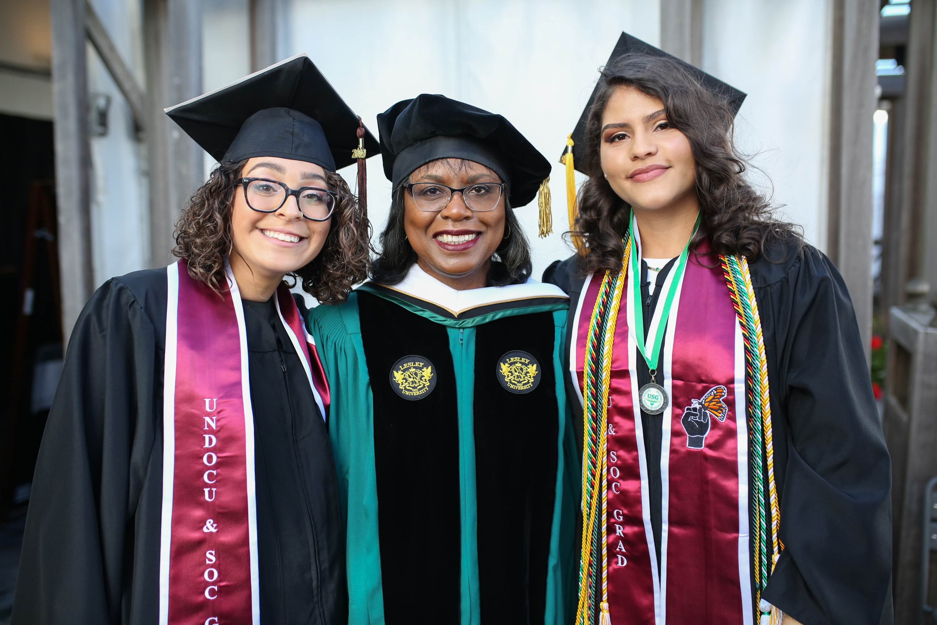 Vita Franjul (right) at Lesley's 2019 Commencement with College of Art and Design student speaker Tianna Rivera and Commencement speaker Anita Hill.