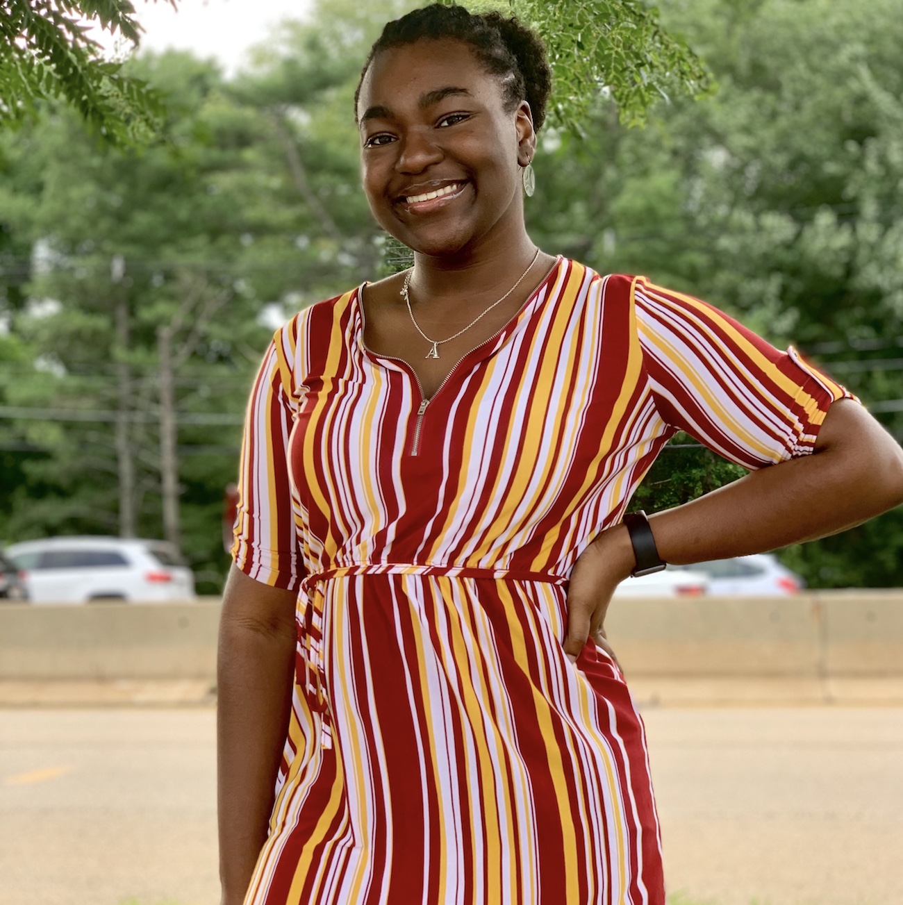 Amara Obiora pictured in a striped dress