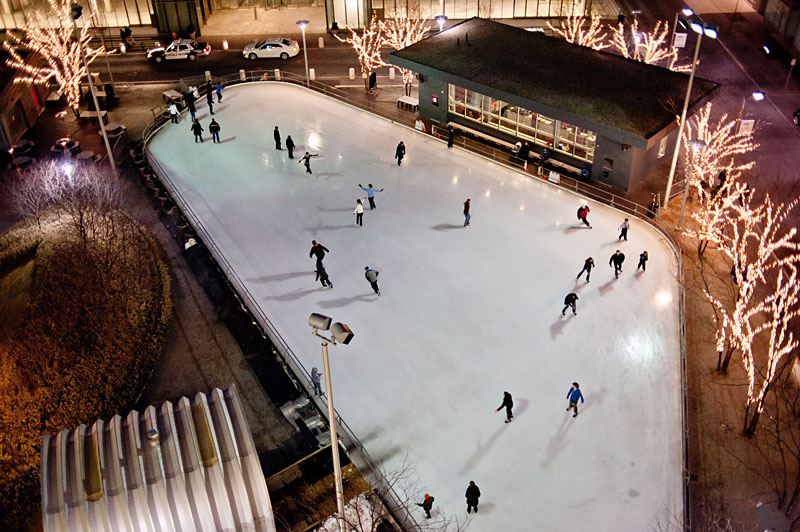 Aerial photograph of Kendall Square Skating Rink at night.