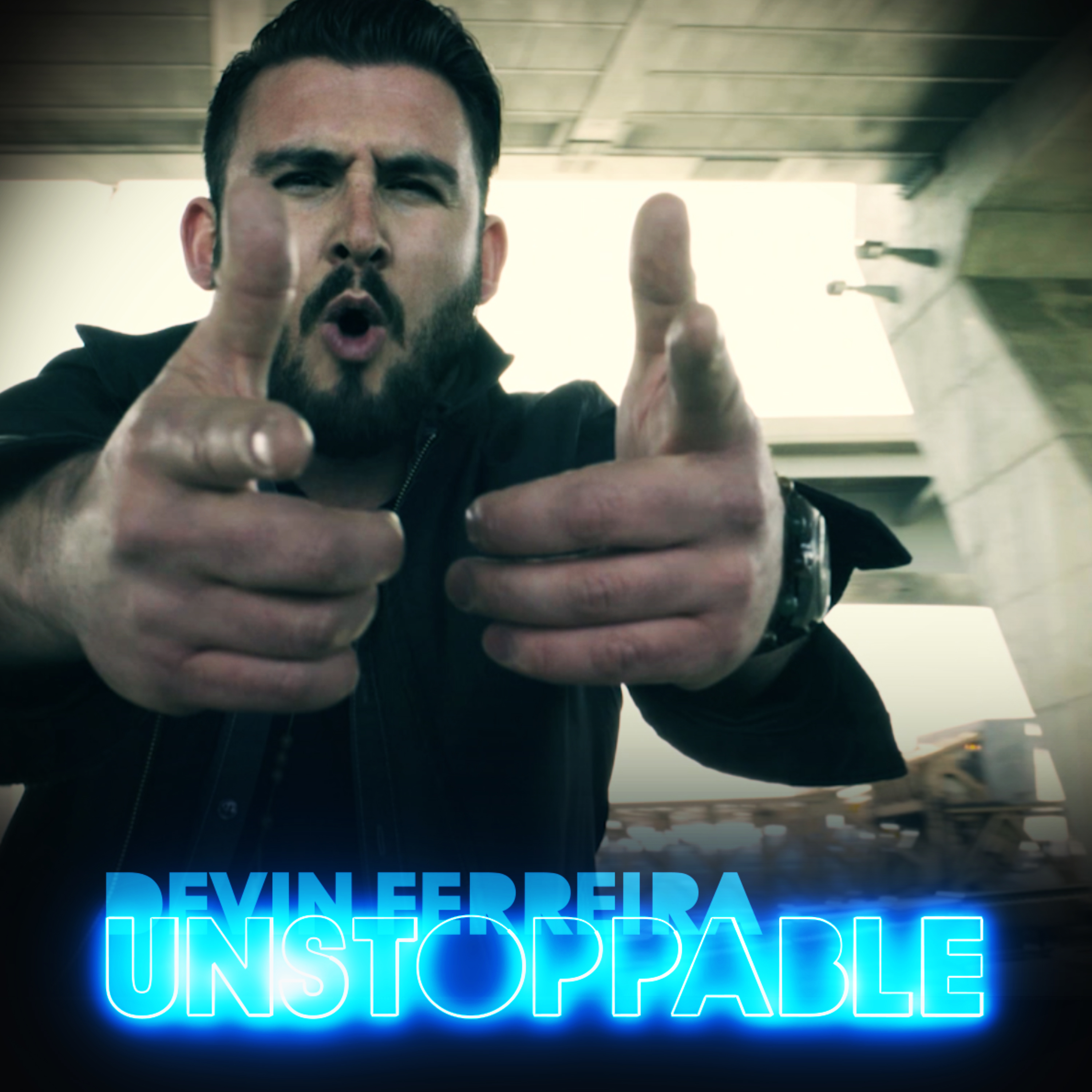 Devin dferreira's album cover, titled "Unstoppable" where he is pointing at camera with both hands, mouth open in a cicular shape. 