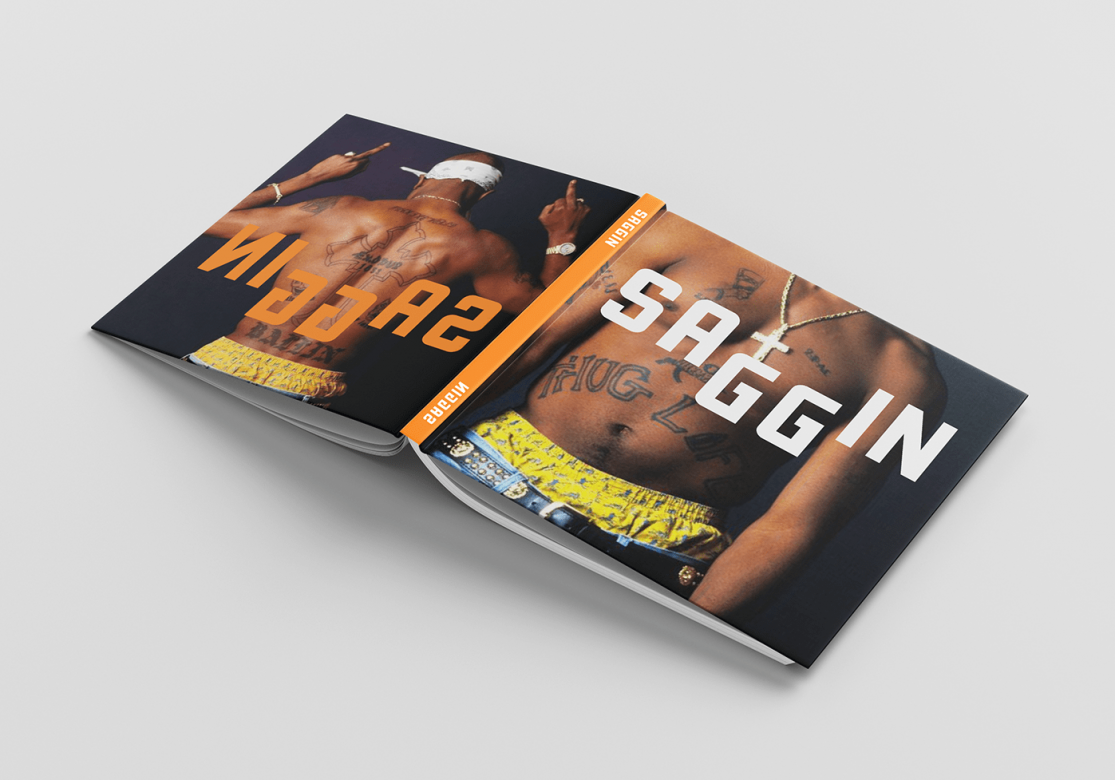 The book "Saggin" laid open so that you can see the front and back cover. The back cover shows the back of a Black man who is holding up his middle fingers. Text on the back is "Saggin" flipped.