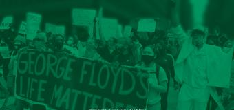 Green filter layered over image of protesters holding various Black Lives Matter-themed signs