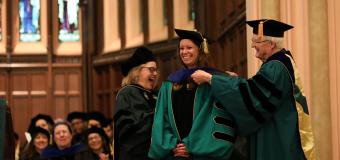 A doctoral candidate is hooded