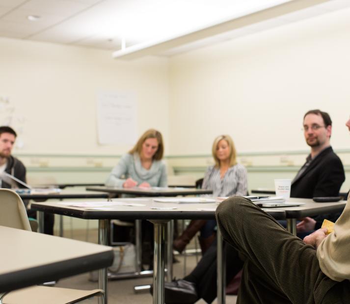faculty leading group discussion