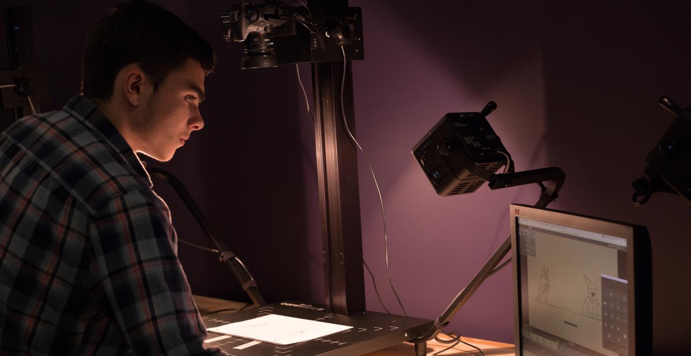 student at stop motion station in the animation studio