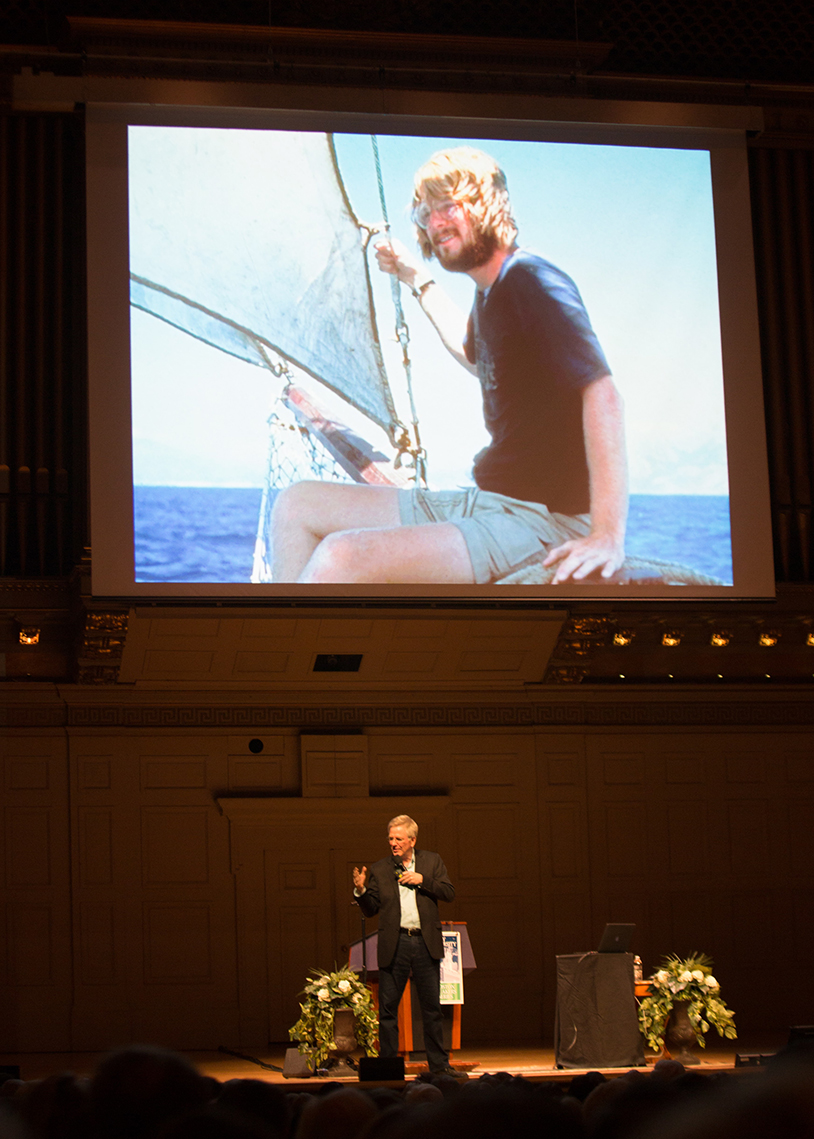 Rick Steves narrates a slideshow at Boston Symphony Hall