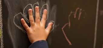 hand with chalk outline Center for Special Education