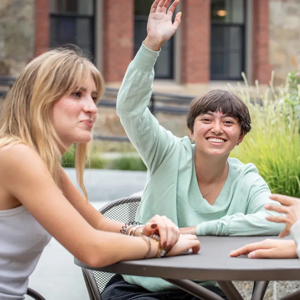 students sitting at table